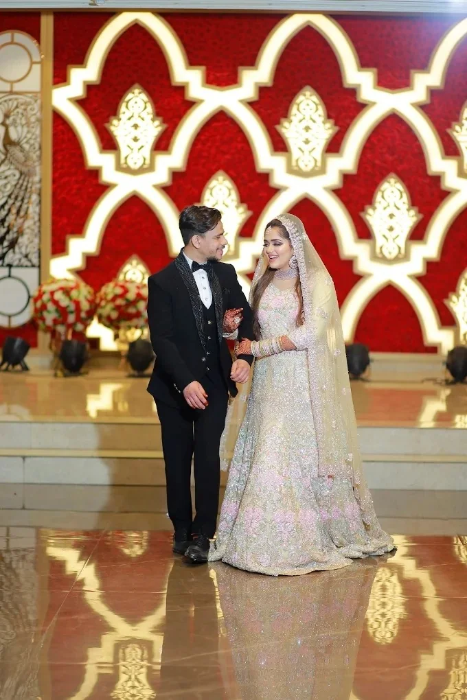 Formal black-tie couple elegance on mirror floor by Wedding Shedding