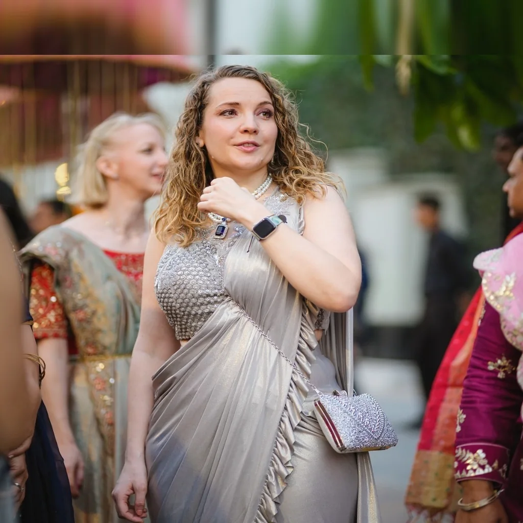 Elegant destination wedding bridesmaid in silver saree by Wedding Shedding