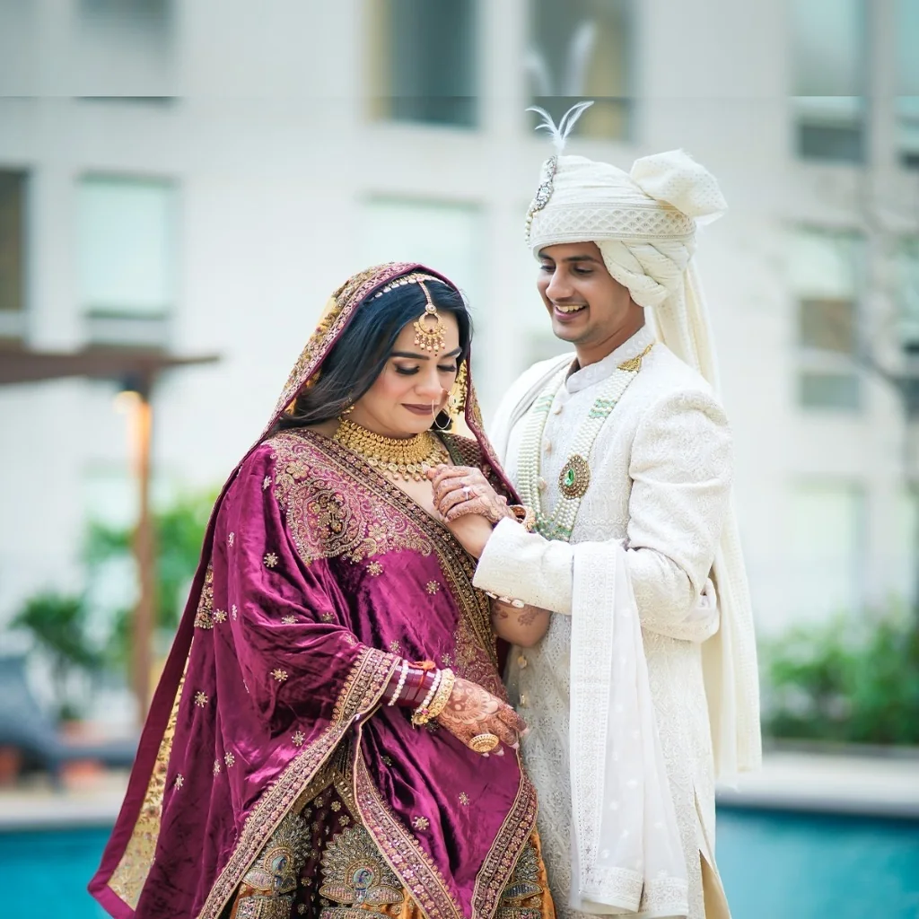 Intimate royal couple embrace with soft warm lighting by Wedding Shedding